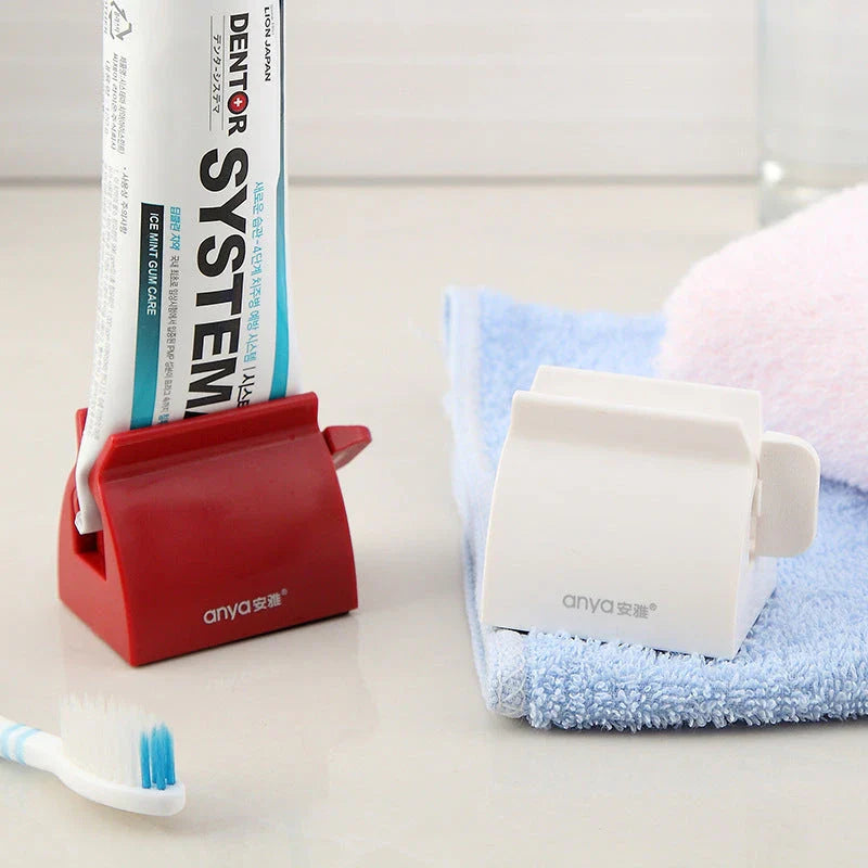 Versatile toothpaste dispenser made of durable ABS plastic for effortless product extrusion and bathroom organization