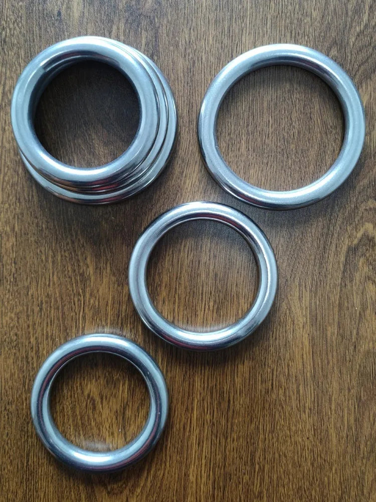 Wing Chun carbon steel training ring showing three adjustable sizes for forearm strengthening exercises