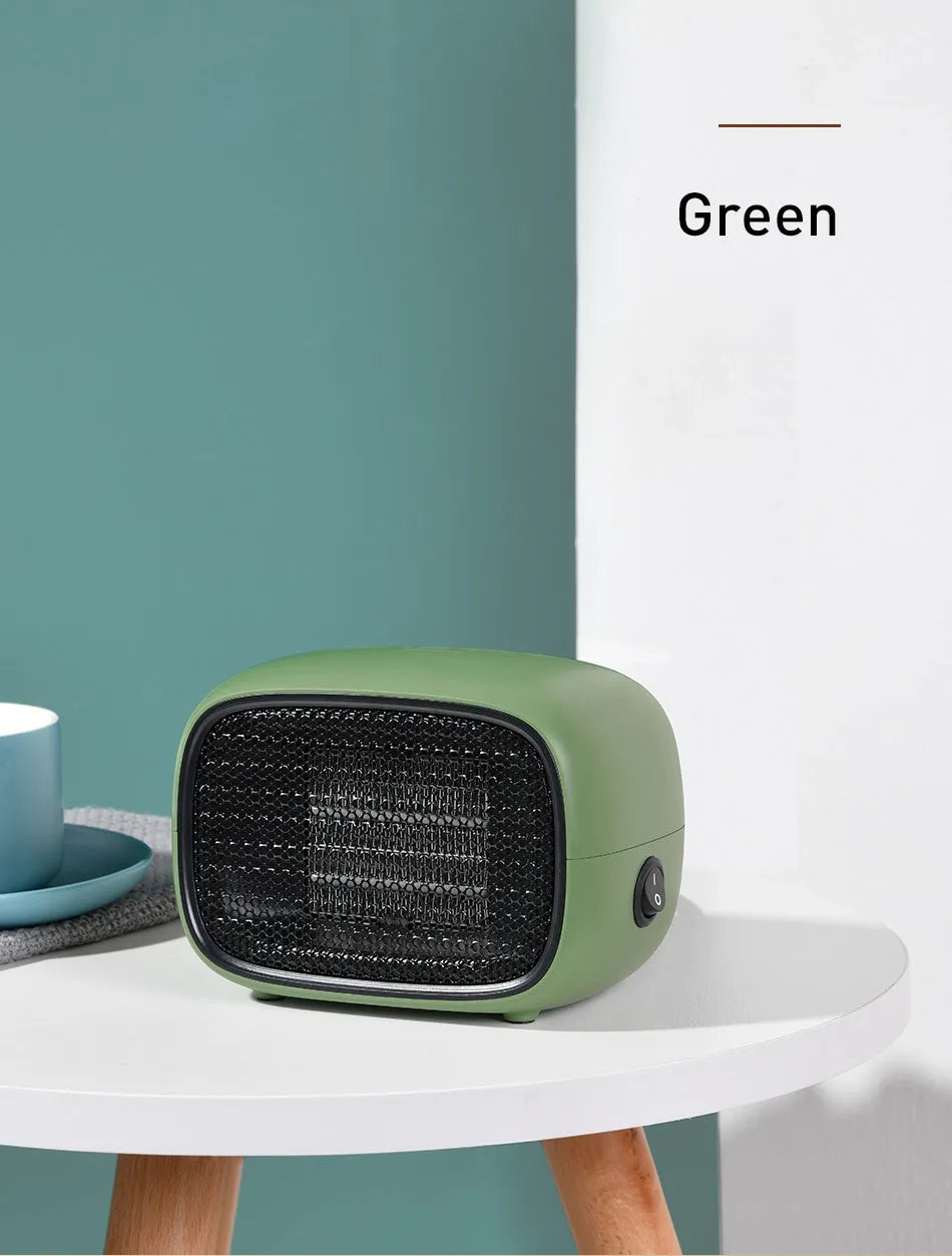 Mini home heater in green, white, or yellow with PTC ceramic heating and compact 158mm x 90mm x 114mm size