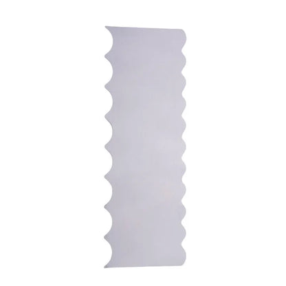 Stainless steel cream scraper with polygon patterns for cake decorating showing six different texture options