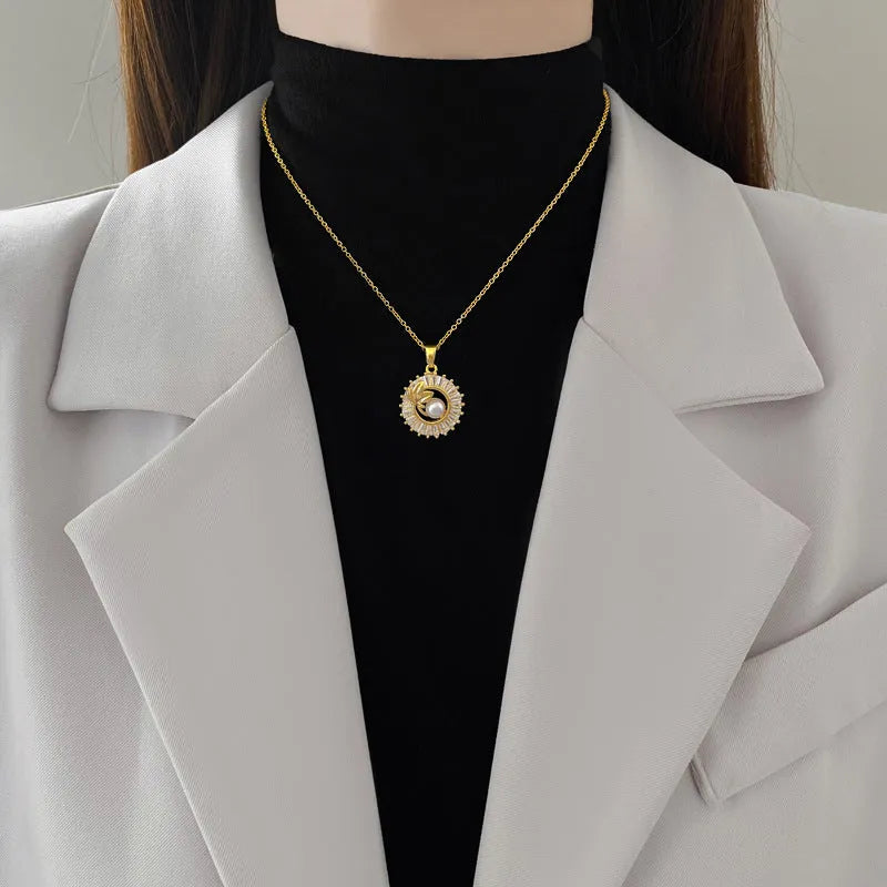 Titanium steel geometric jewellery set with leaf pendant necklace and matching stud earrings