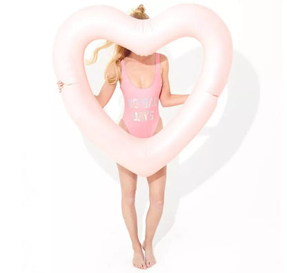 Oversized 120cm heart-shaped swim ring for adults in vibrant colors