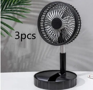Black telescopic portable folding fan shown extended to full height on a desk, with control panel visible.