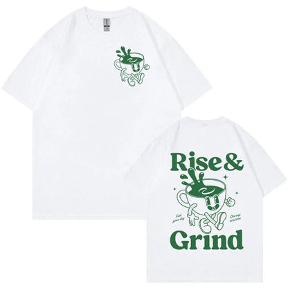 Man wearing a loose linen t-shirt with a printed Rise And Grind Green Coffee cartoon illustration.