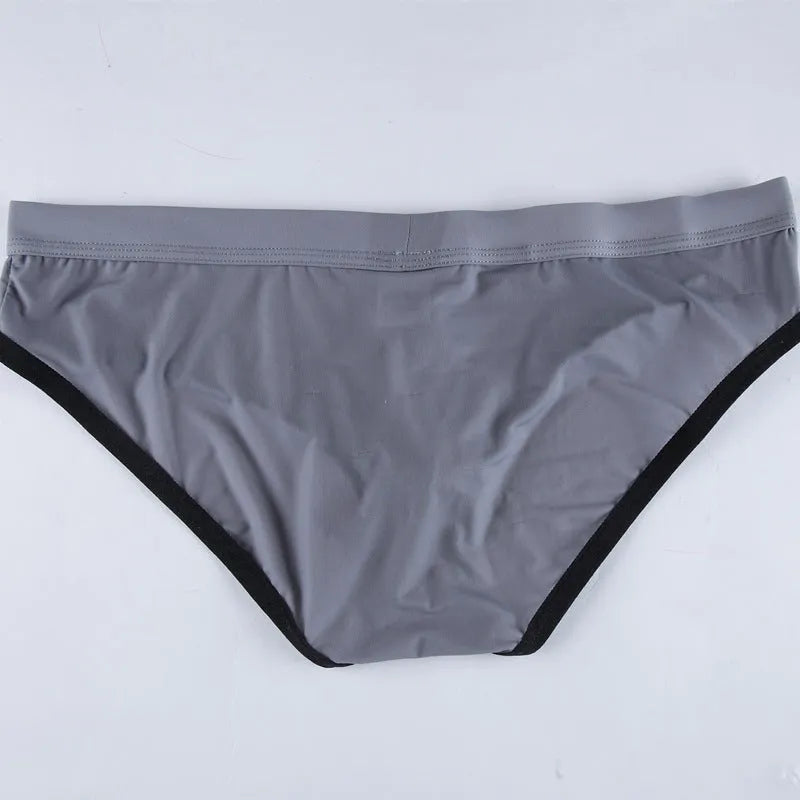 Men's underwear briefs in thin ice silk fabric with bazooka bullet separation for sports, available in mid waist design with quick drying and breathable function in white, black, sky blue, dark gray, grass colour, Army Green, and skin colour shades