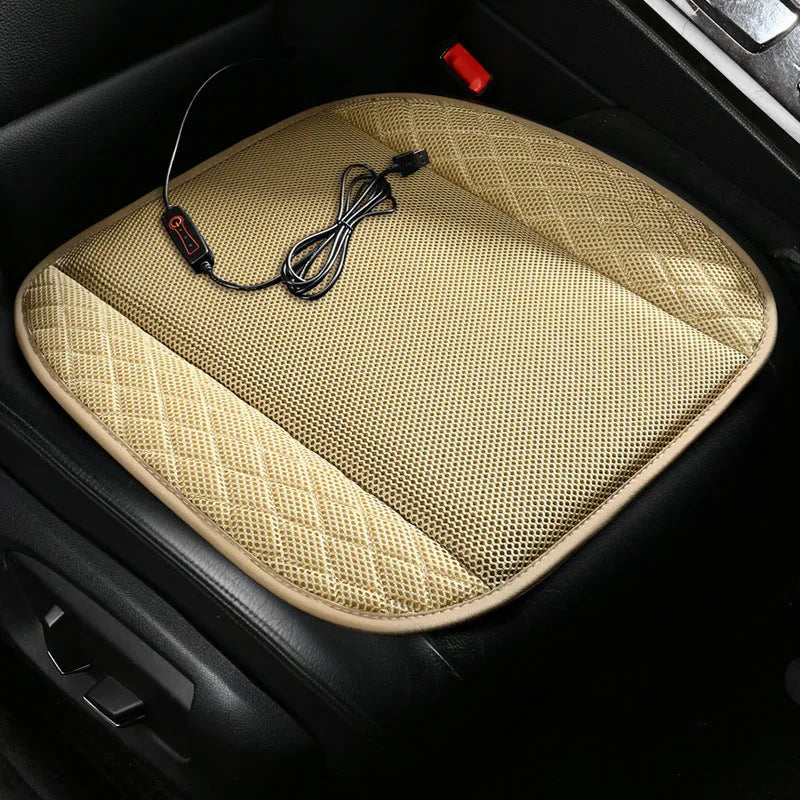 USB ventilated car seat cushion in black suede with leather trim, showing integrated cooling fans and power cable