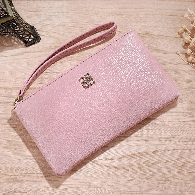 Long 55 cm PU leather wallet handbag in wine red colour with zipper closure open showing interior phone pocket and card slots