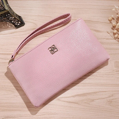 Long 55 cm PU leather wallet handbag in wine red colour with zipper closure open showing interior phone pocket and card slots