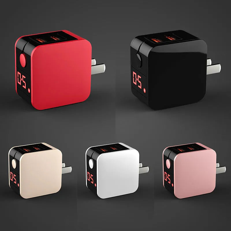 Black dual USB fast charger with digital voltage display showing 5V output and foldable UK plug