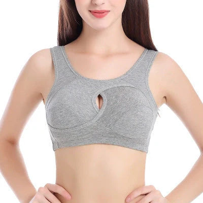Supportive and comfortable cotton sports bra with crossover design for bust enhancement and posture support during workouts