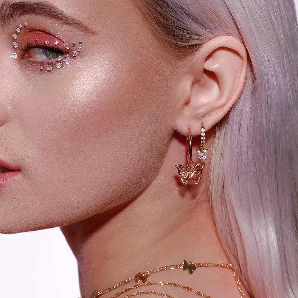 Butterfly earrings with elegant bow styling in rose gold and gold finishes