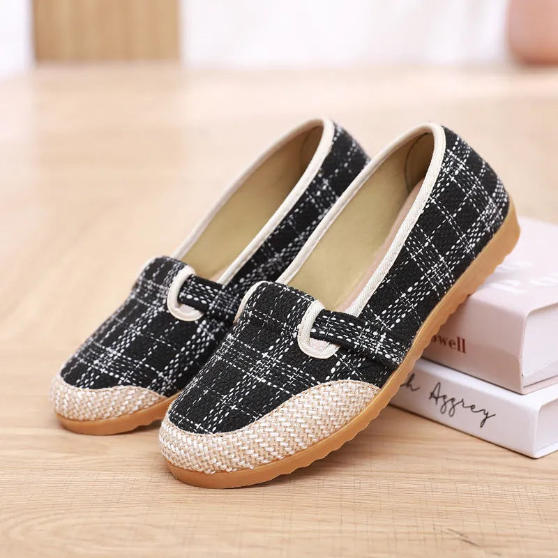 Women's ethnic style cloth shoes with shallow mouth design, colour stitching, and flat heel