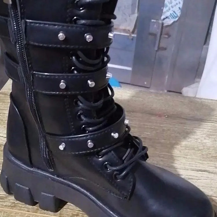 Women's black mid-calf knight boots with side zipper and metal buckle details