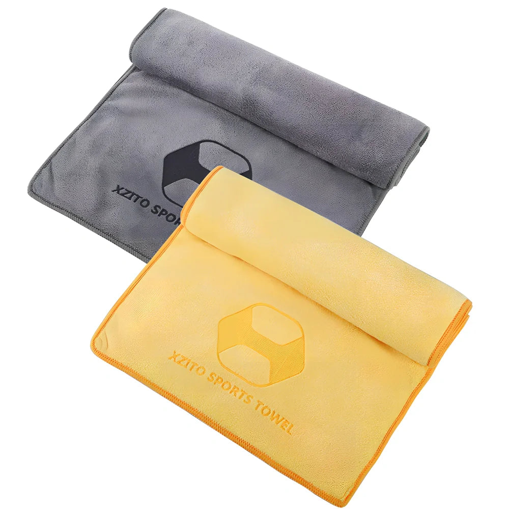 Blue sports sweat absorbent towel with 100x30cm dimensions and polyester-nylon fabric for athletic use