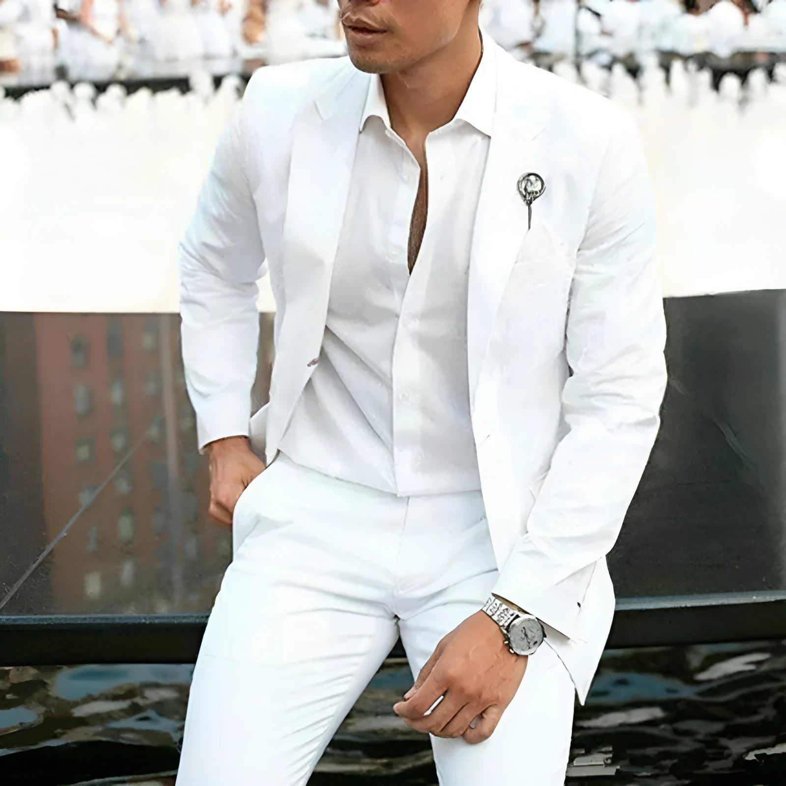 Men's white two-piece suit in slim fit for weddings, made from cotton blend fabric.