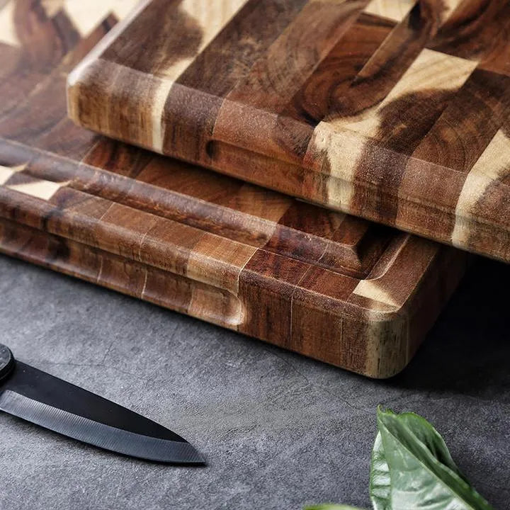 Brown solid acacia wood cutting board with 3cm thick edge, shown in large and small size options.