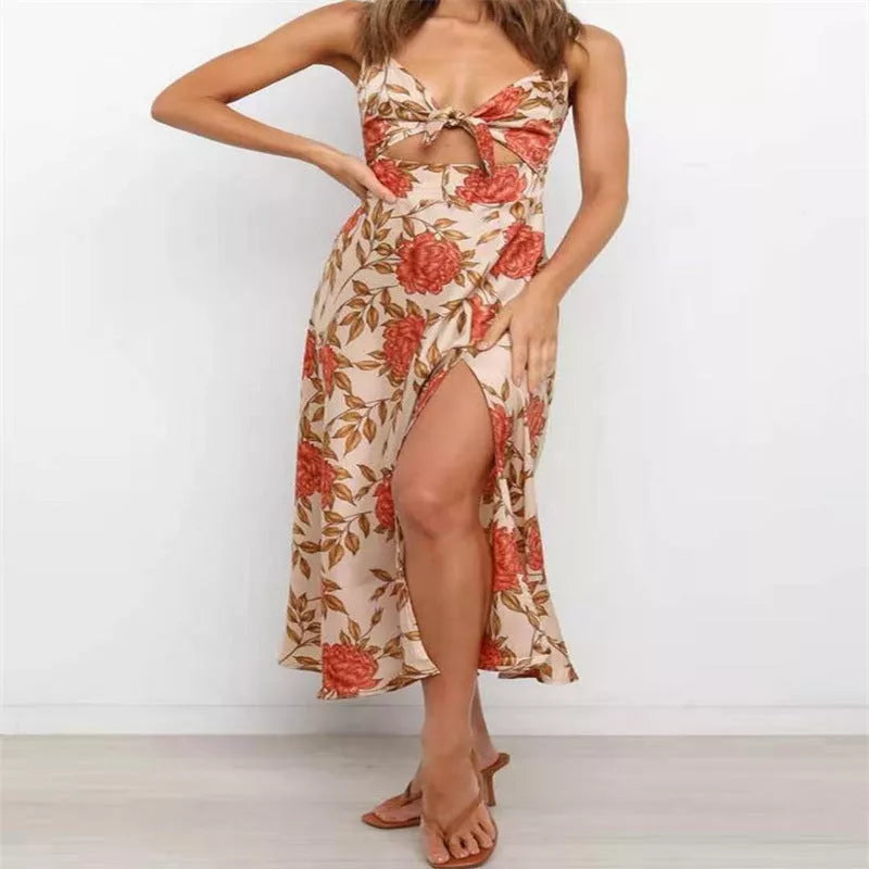 Women's sleeveless beach dress with flower print and hollow bowknot design