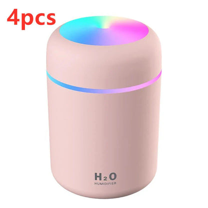 Compact and Quiet Bedroom Mist Humidifier with Soothing Mood Lighting in White, Navy Blue, and Pink Colors