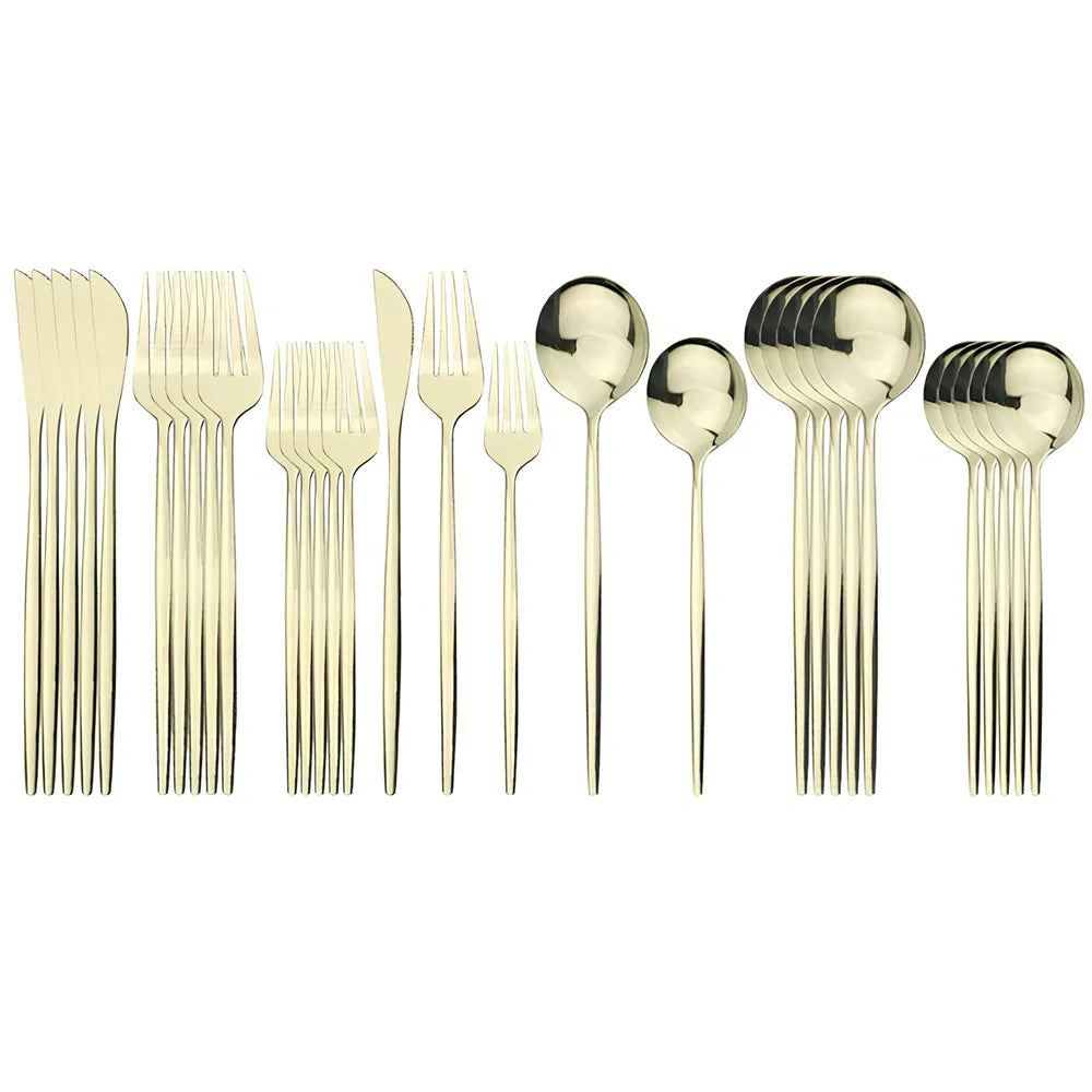 36-piece stainless steel cutlery set with mirror-polished table knives, forks, spoons, dessert forks, and dessert spoons arranged for six place settings