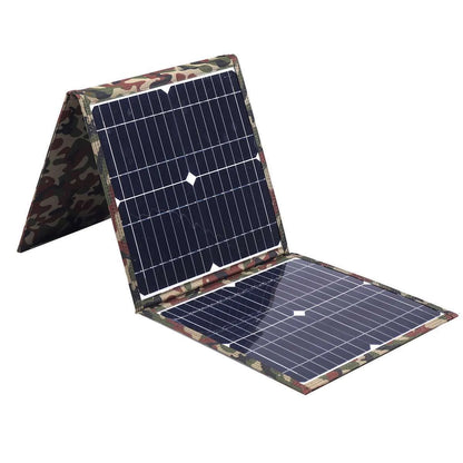Black foldable portable solar panel unfolded showing solar cells, with included car charger and USB adapter.