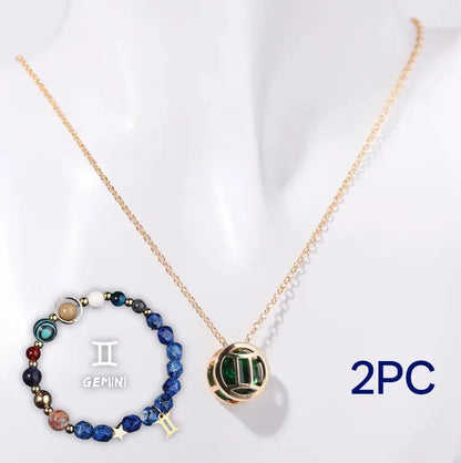A natural stone beaded necklace and matching adjustable bracelet laid flat.
