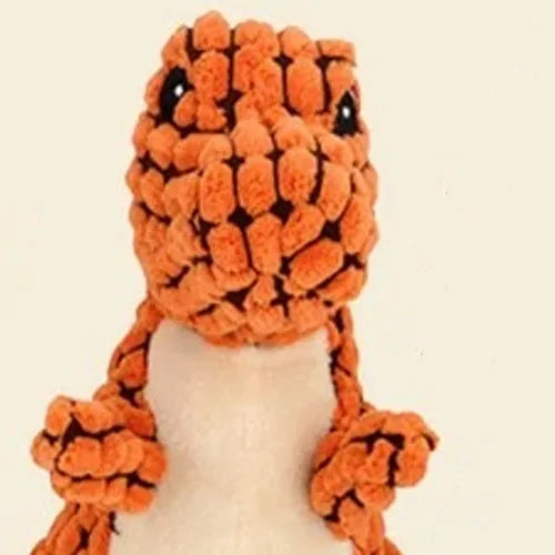 Durable grey, green, and orange dog toy with sound for biting and boredom relief.