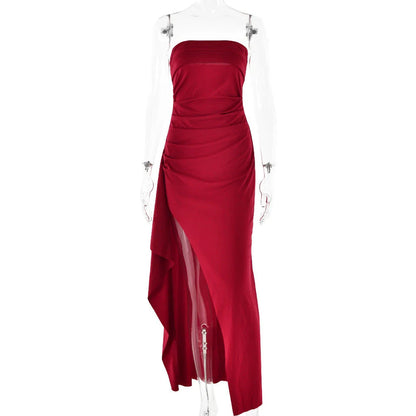 Backless pleated maxi dress in various colors, featuring high-waisted silhouette and unique design