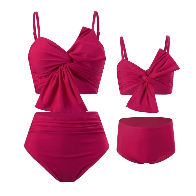 Women's big bow print bikini and swim trunks set in nylon fabric showing colour options