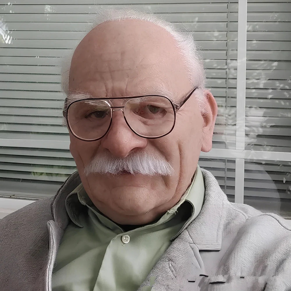 Latex old man Halloween mask with white hair and beard showing realistic facial wrinkles