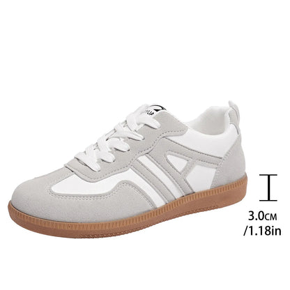 Women's retro lace-up jogging shoes in black, grey, or khaki with a platform sole.