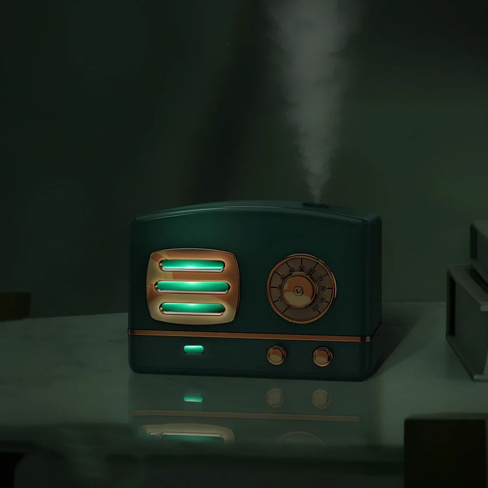 Retro humidifier in green colour with 15cm height and 10cm diameter, showing water tank and control button