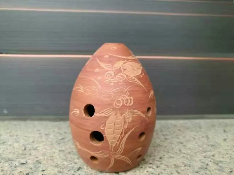 Seven Star Ancient Xun Musical Instrument with eight holes and pear shape in various colors