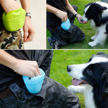 Black silicone dog training treat pouch with clip and magnetic closure shown attached to a belt.