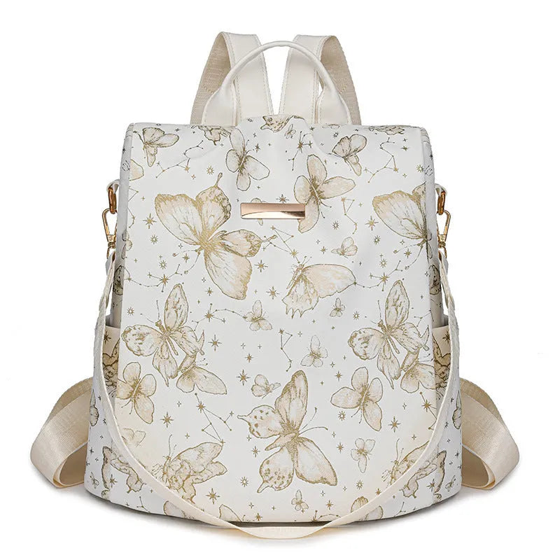 Butterfly printed large capacity PU backpack in various colours with sewing line details and an ergonomic back.