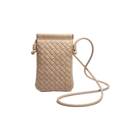 Vertical square vintage weave crossbody bag in multiple colours showing internal dark cell phone pocket.