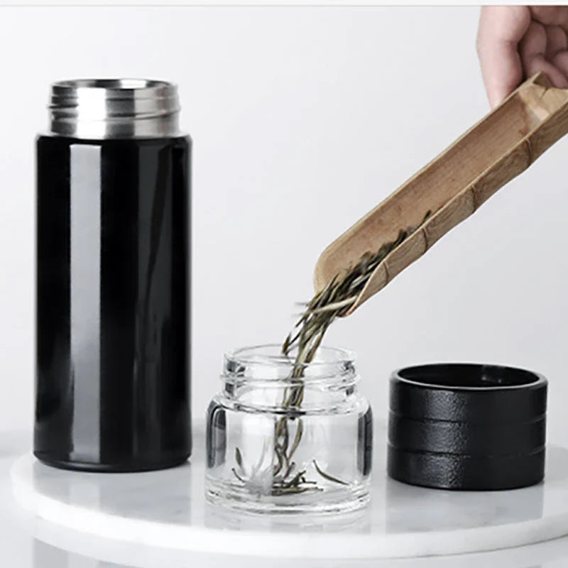 Premium insulated tumbler with digital temperature display, made of durable stainless steel, silicone, and glass materials