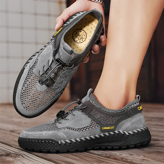 Men's brown suede casual tennis shoes with elastic band closure and hand-stitched rubber sole.