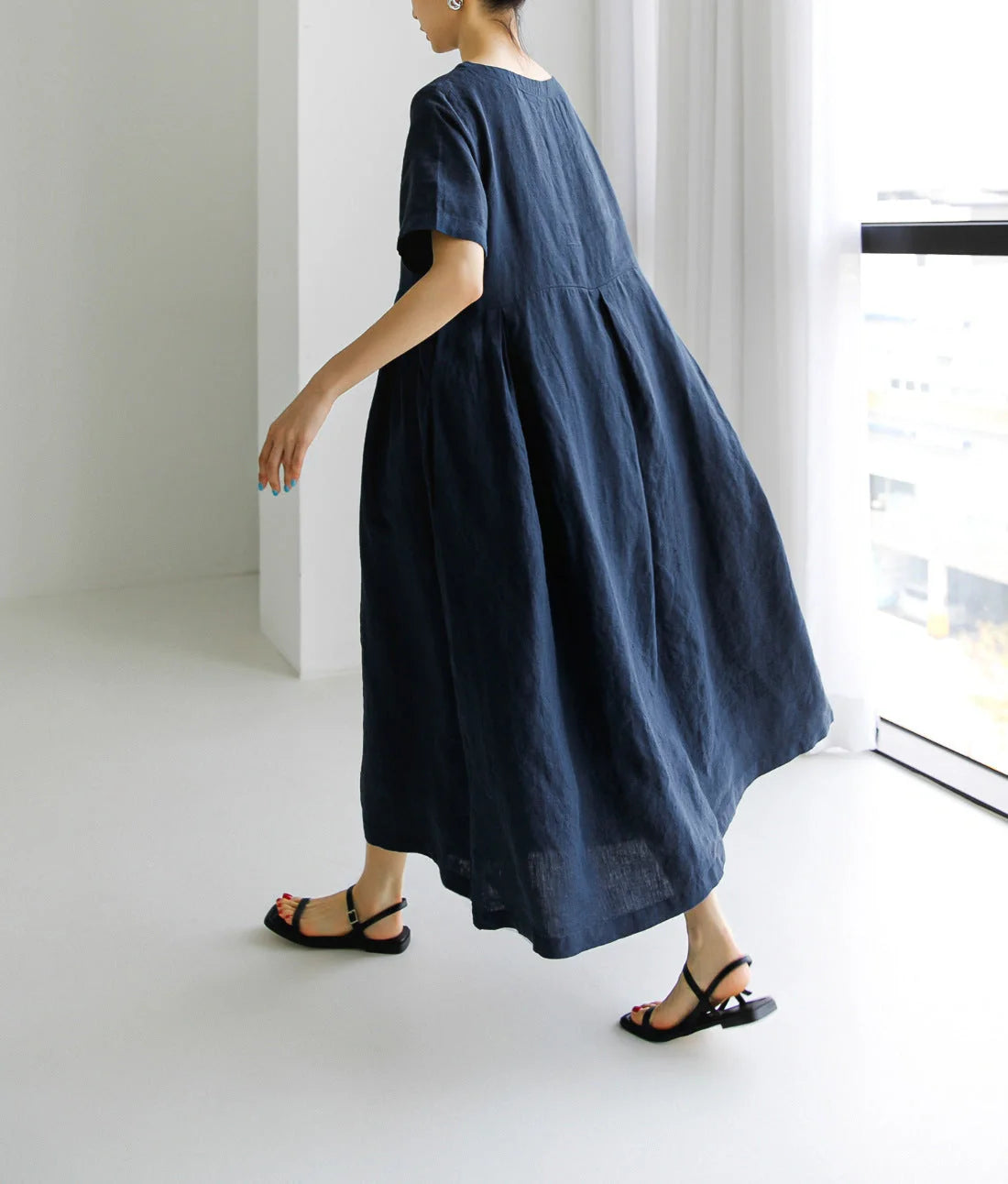 Comfortable cotton linen round neck dress in navy blue, army green, and apricot colors, perfect for casual wear.