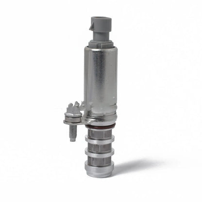 A pair of silver automotive VVT oil control solenoid valves for Buick and Chevrolet models.