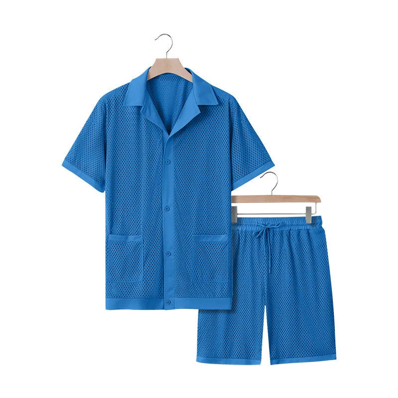 Women's lake blue see-through short sleeve cardigan and matching shorts beach cover-up set laid flat.