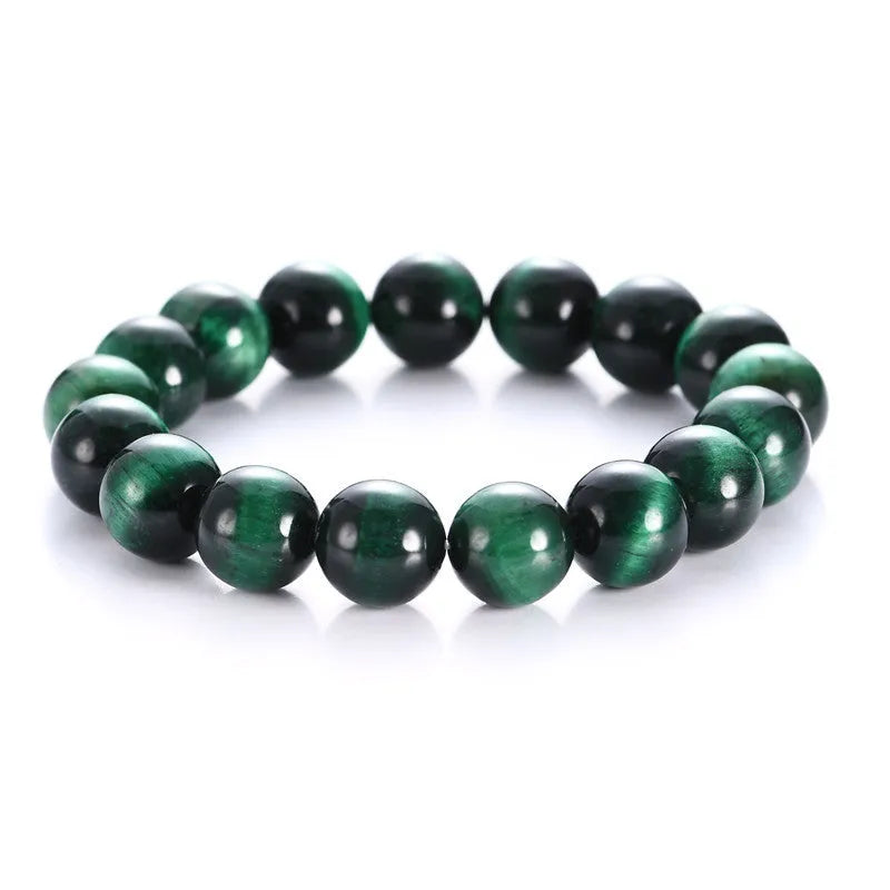 Green Tiger Eye stone bracelet with geometric beads, showing size options.