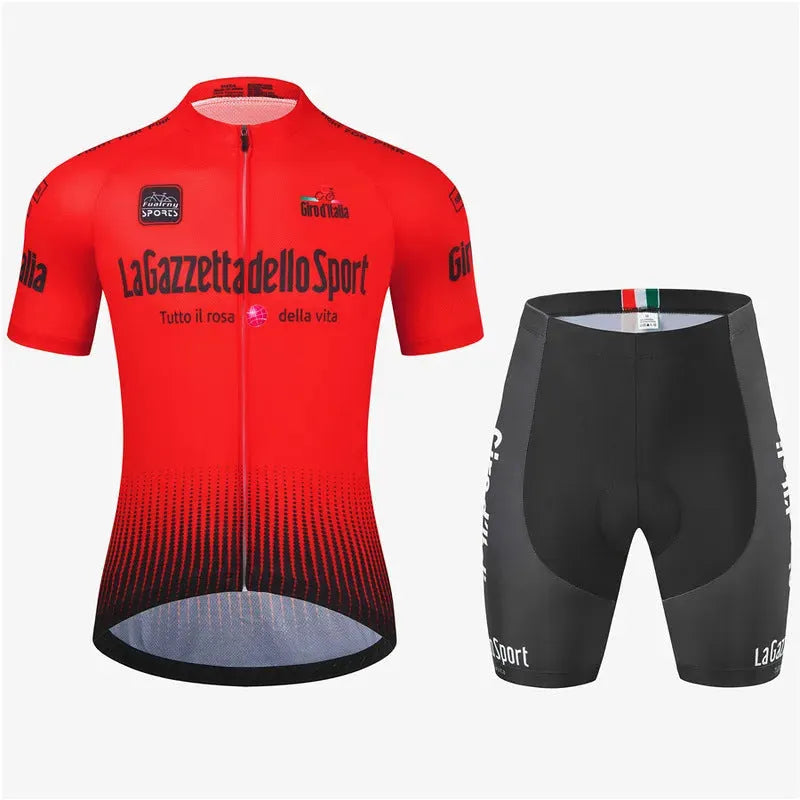 Loop short sleeve cycling suit in a patterned colour on a road bike, showing moisture-wicking fabric.