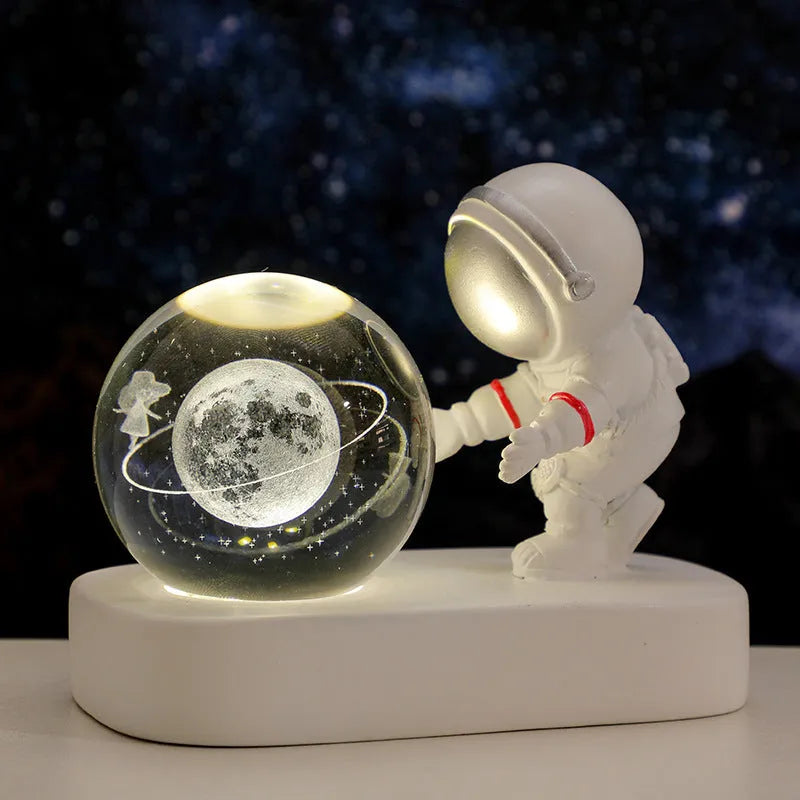 Astronaut crystal ball night light projecting galaxy pattern on 6cm resin sphere with USB cable