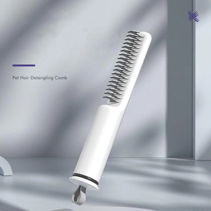 Stainless steel dog dematting comb with ergonomic handle, shown in pink colour on a white background.