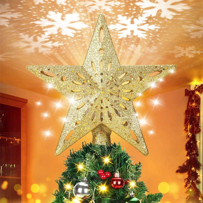 3D Glitter Silver Snow Christmas Tree Topper with LED Snowflake Projector illuminating a room with festive patterns