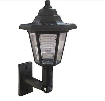 Black hexagonal solar-powered wall lamp for outdoor garden or patio lighting