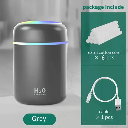 Compact USB car humidifier with colourful LED light and 300ml water tank for vehicle use