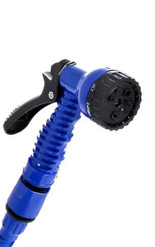 Blue telescopic water hose with high-pressure gun, expanded for use in garden watering