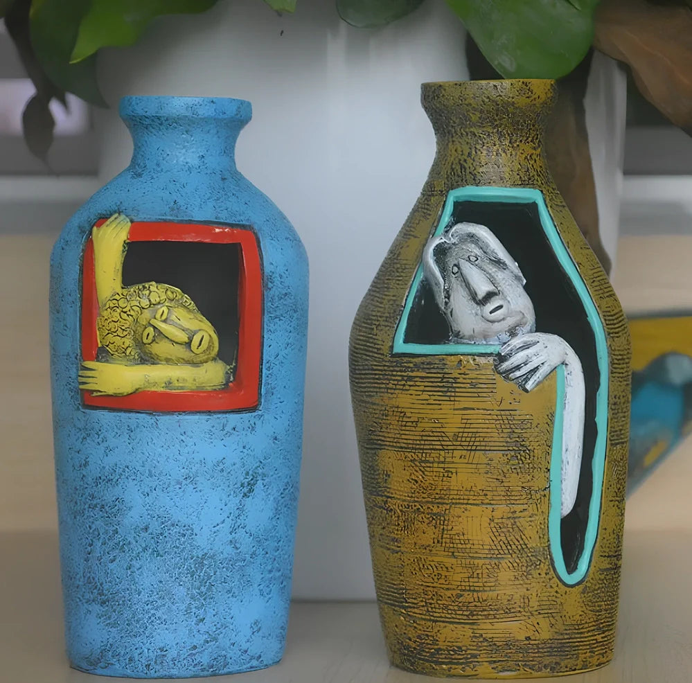 Blue hand-painted abstract resin wall vase measuring 18cm tall with pendant hanging form