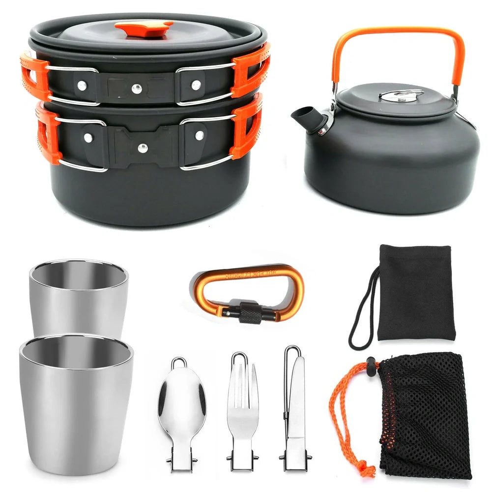 Outdoor camping cookware set with saucepan, frying pan, teapot, and stainless steel cups in mesh storage bag